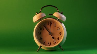 analog clock goes on a green screen, timelapse, fast passage of time