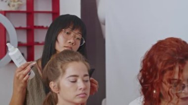 cosmetics and work as a stylist and makeup artist, women paint lips, eyes, face,