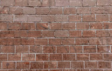 Yatay tuğla kaplama arka plan. Eski kırmızı tuğla duvar kapanıyor. Klasik ev cephesi. Soyut doku arkaplanı.