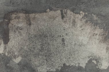 Eski beton duvar, soyut grunge arka plan. Hasarlı ve çatlaklı bir çimento dokusu..