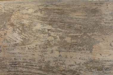 Detaylı desenli fırçalanmış bej duvar arkaplanı. Fırça darbeleriyle sıvanmış bir yüzey..