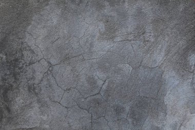 Çizikli çatlamış beton duvar dokusu. Eski gri çimento duvar arka planı.