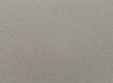 Abstract paper background. Horizontal vintage grey craft paper texture close up. Easily add organic texture and depth to your designs.