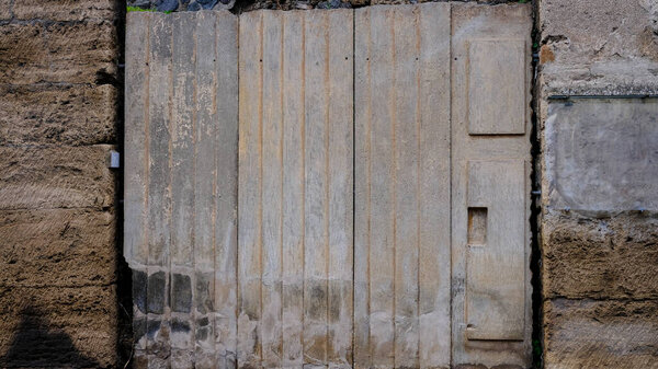 Italy, Pompeii - October 2021: Cast of workshop door. Pompeii excavations