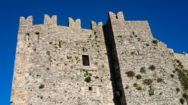 Erice, Sicily, Italy. Glimpse of the castle of Venus with blue sky