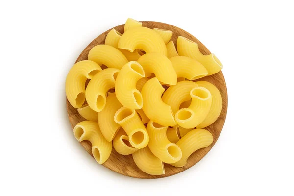 Raw macaroni pasta in wooden bowl isolated on white background with clipping path and full depth of field. Top view. Flat lay — Stock Photo, Image