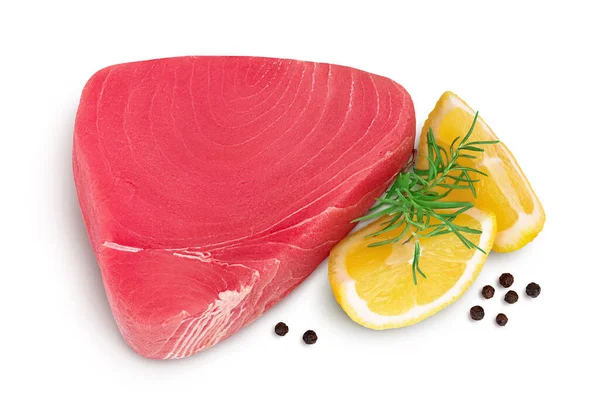 Fresh tuna fish fillet steak with rosemary, lemon and peppercorns isolated on white background with clipping path. Top view. Flat lay — Stock Photo, Image