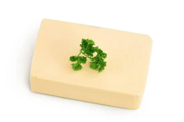 Manteiga isolada sobre fundo branco com caminho de recorte e profundidade total de campo. Vista superior. Depósito plano — Fotografia de Stock