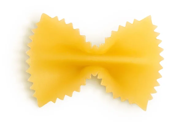 Bow tie pasta isolated on white background with clipping path and full depth of field. Top view. Flat lay. — Stock Photo, Image