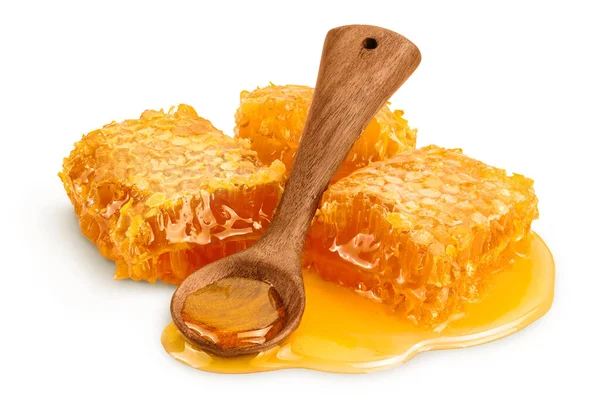 Honeycombs and honey puddle with spoon isolated on white background with clipping path and full depth of field — Stock Fotó