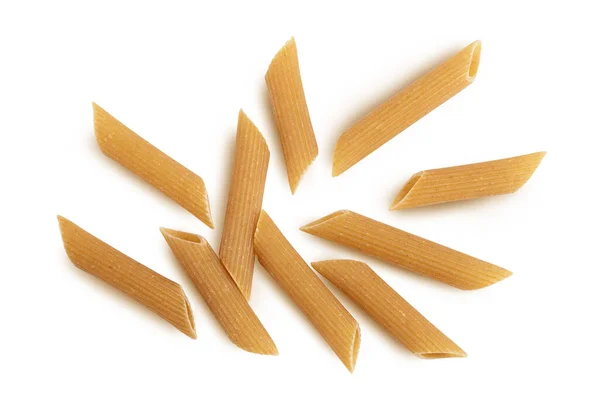 Wolegrain penne pasta from durum wheat isolated on white background with clipping path and full depth of field. Top view. Flat lay, — Stock Photo, Image