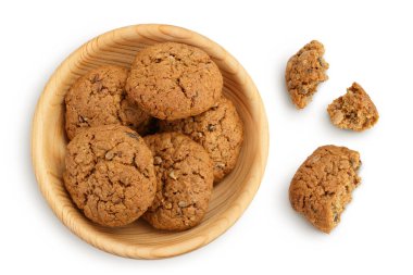 Tahta kasede keten, balkabağı ve ayçiçeği tohumlu yulaf ezmeli kurabiyeler kırpma yolu ve tam derinlikte tarla. Üst Manzara. Düz yatıyordu