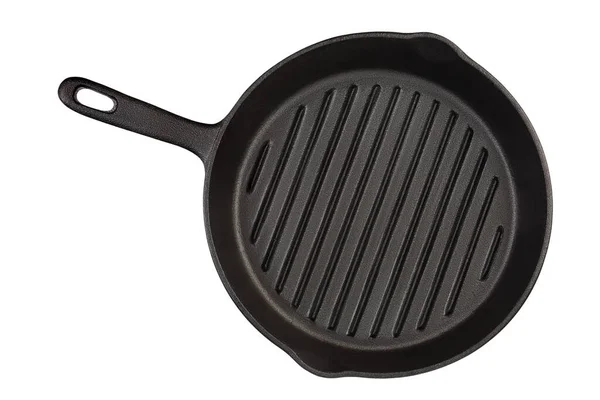 Empty cast iron grill frying pan isolated on white background with clipping path. Top view. — Stock Photo, Image