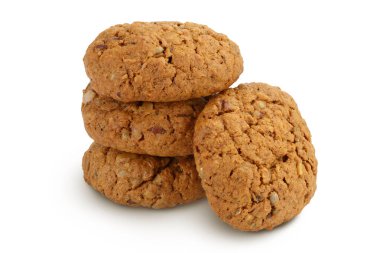 Flax, balkabağı ve ayçiçeği tohumlu yulaflı kurabiyeler kesme yolu ve tam derinlikteki beyaz zemin üzerinde izole edilmiş.