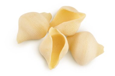 Conchiglioni İtalyan makarnası kesme yolu olan beyaz arka planda izole edilmiş. Üst Manzara. Düz yatıyordu