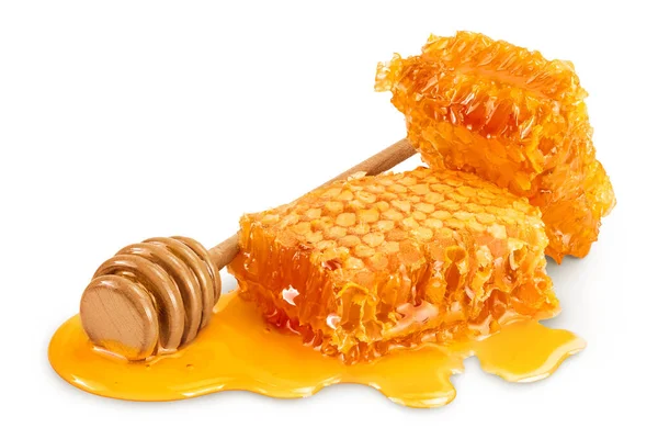 Honeycombs and honey puddle isolated on white background with clipping path and full depth of field — Stock Photo, Image