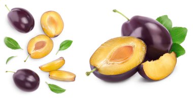 fresh purple plum and half with leaves isolated on white background. Top view. Flat lay. Set or collection.