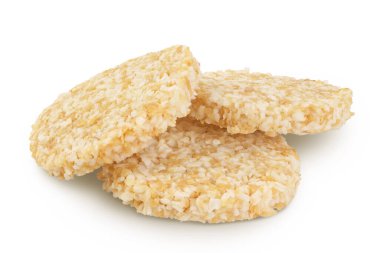 Beyaz keten tohumu ve bal içeren hindistan cevizli kurabiyeler beyaz arka planda tam derinlikte izole edilmiş. Sağlıklı yemek..