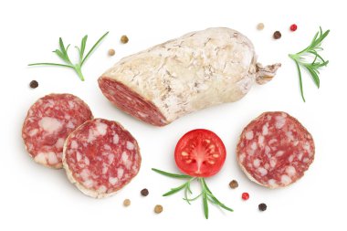 Cured salami sausage slices isolated on white background. Italian cuisine with full depth of field. Top view. Flat lay