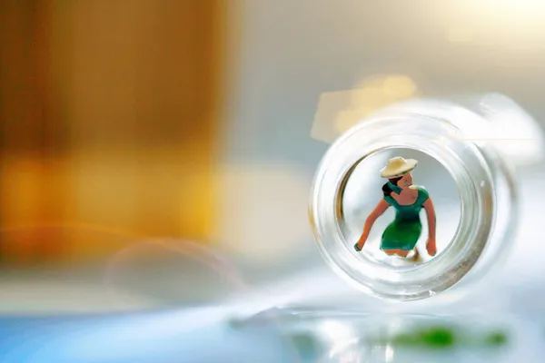a closeup shot of a miniature figure of a doctor