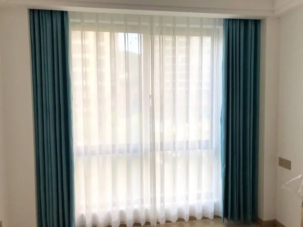 window with blinds and curtains