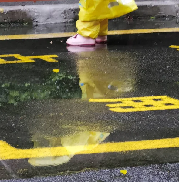 car cleaning road with yellow paint