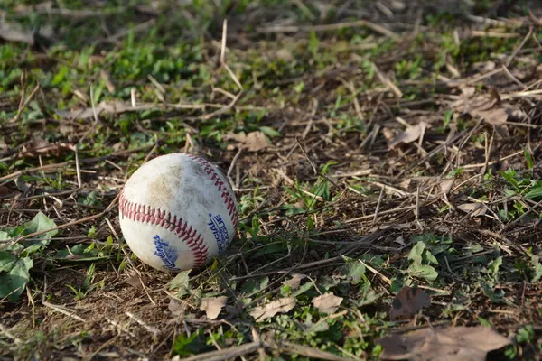 baseball ball on the ground