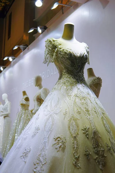 wedding dress on mannequin in the shop