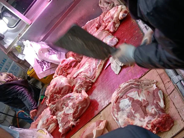 butcher meat at the market
