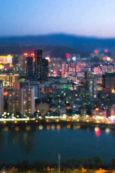 blurred city skyline at night