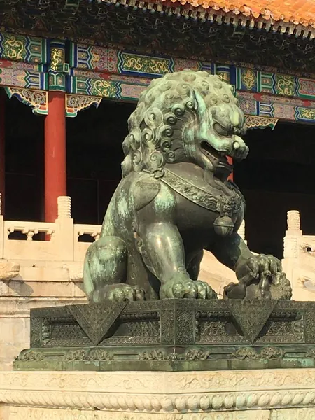 the lion statue in the forbidden city, china
