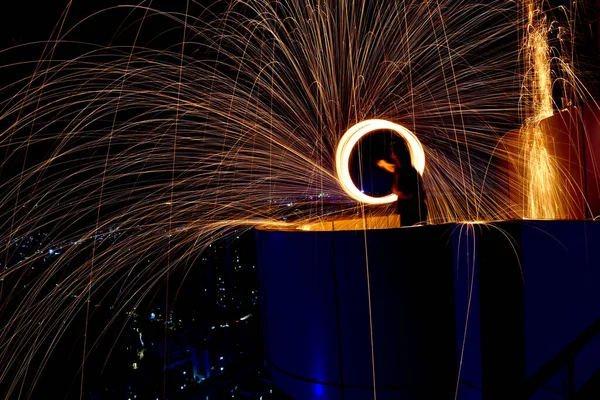 sparks welding metal with fire