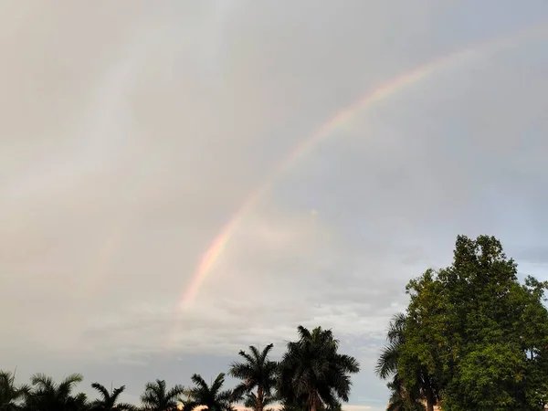 rainbow sky with clouds