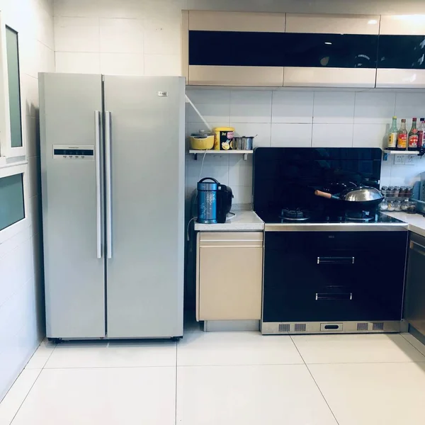 modern kitchen interior with blue and white appliances