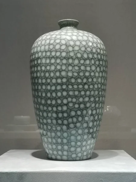empty glass vase on a white background