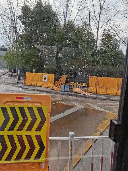 road sign with a lot of construction signs