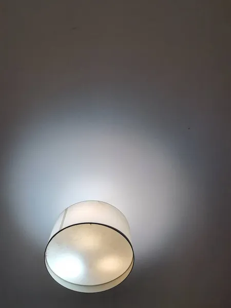 white ceiling lamp on a black background