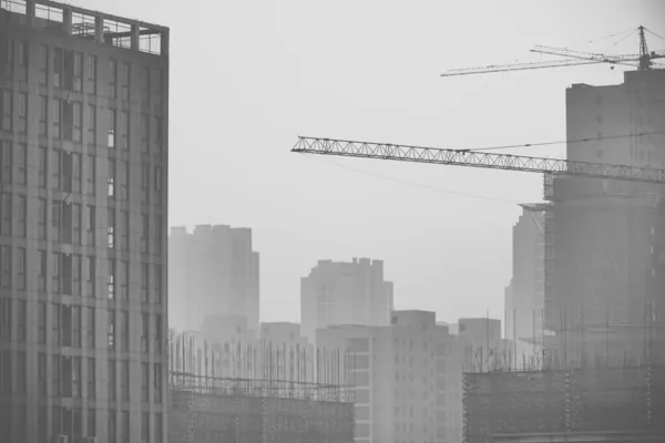 building construction site, black and white