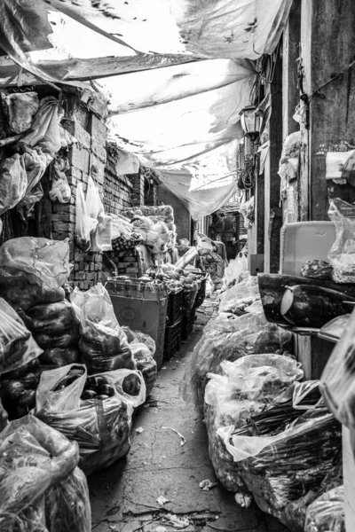 black and white image of a street market
