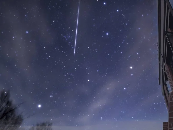 night sky with stars and snow