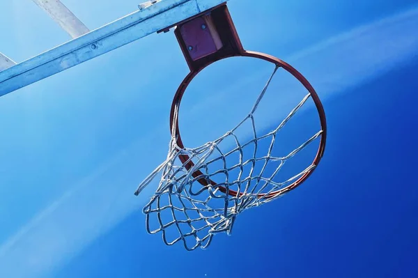 basketball hoop on the blue sky background