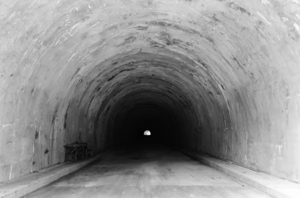 empty underground tunnel with concrete floor