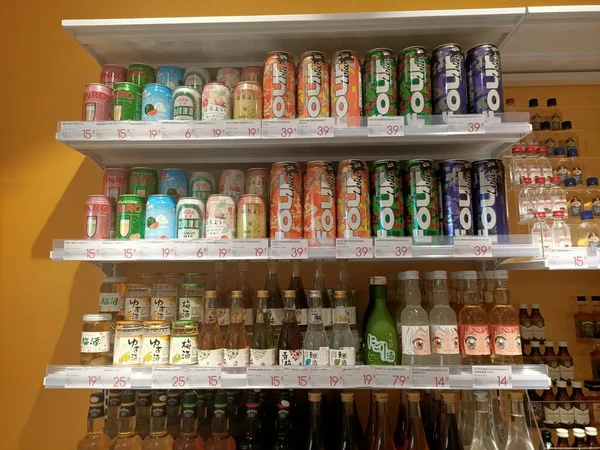 shelves with different medicine bottles in a store