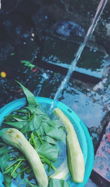 green and white pepper in a basket