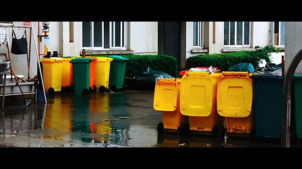 colorful plastic trash bags in the street