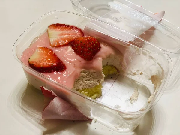 strawberry ice cream in glass jar