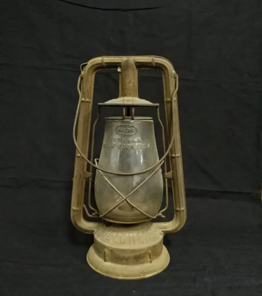 old vintage kerosene lamp on a dark background