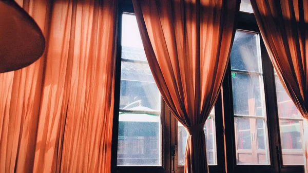 window with curtains and windows in the interior