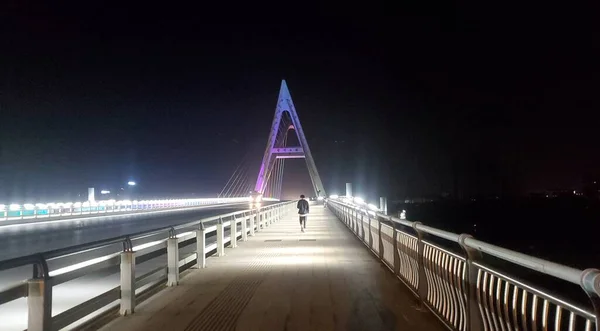 night view of the city of the bridge in the evening