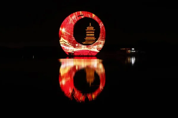 red lantern on the water